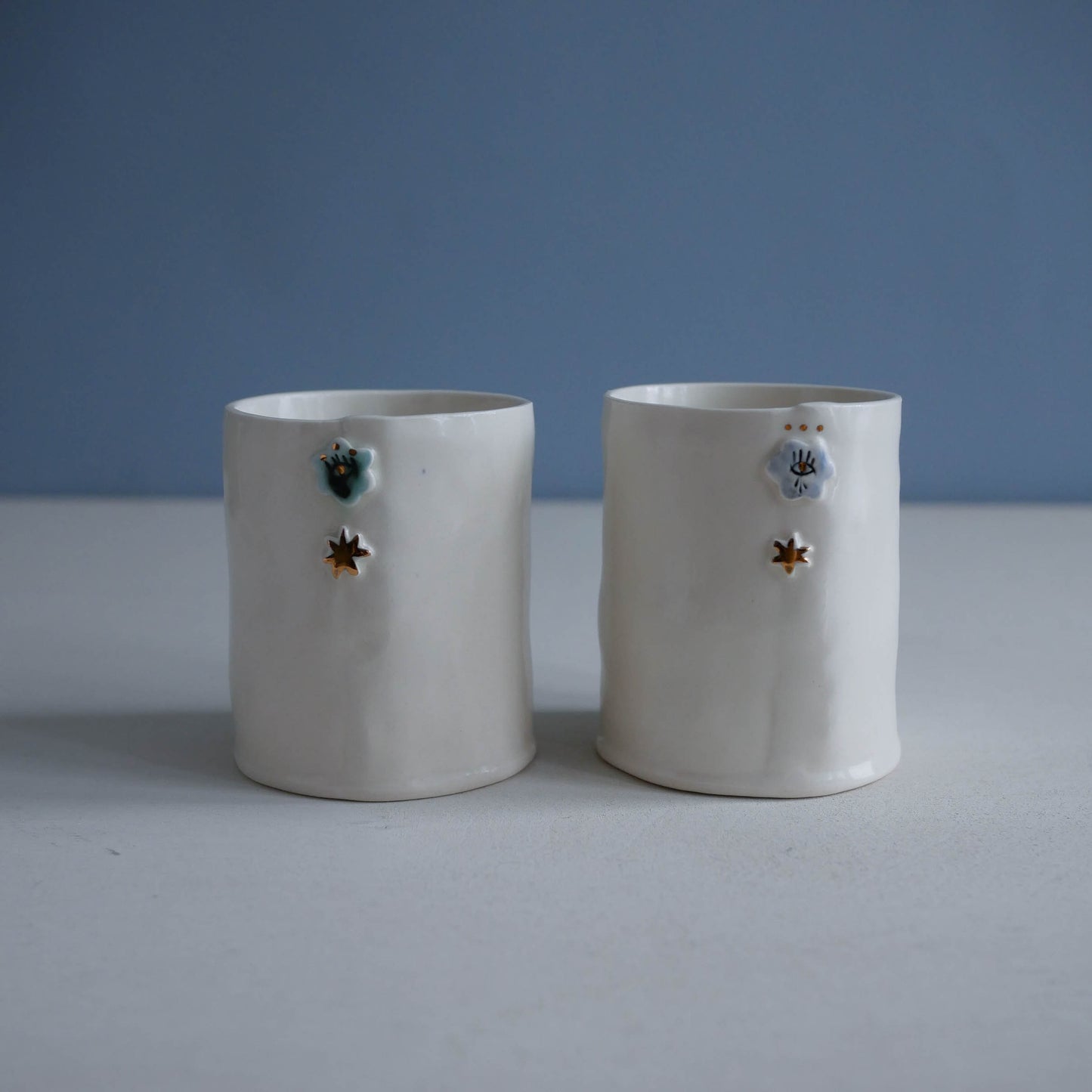 Cup * Goose (one on the left)