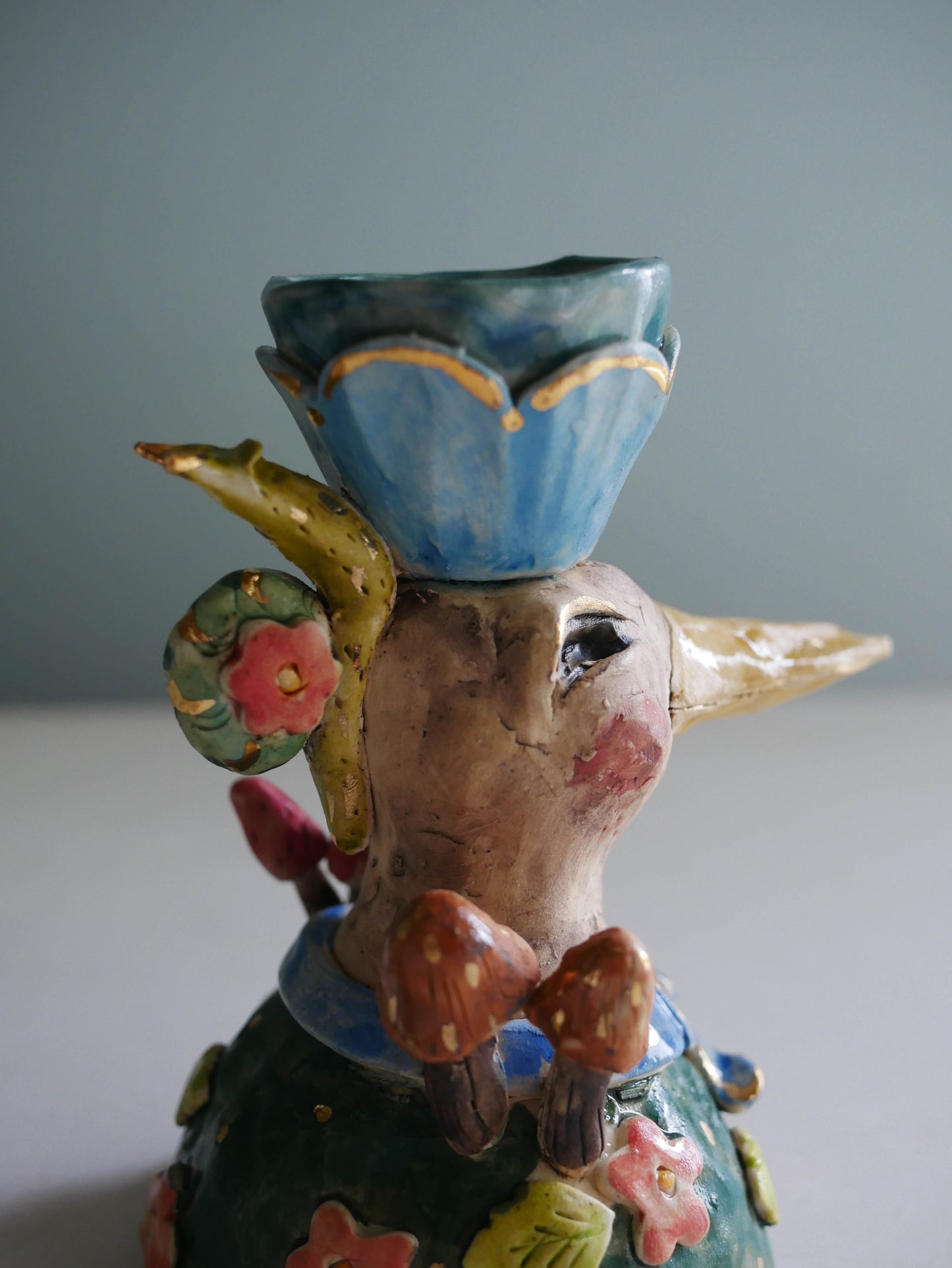 Sculpted bird candle holder/ blue bow