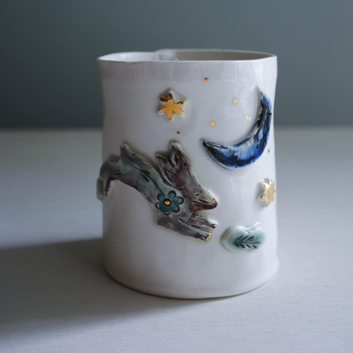 cup * Leaping rabbit