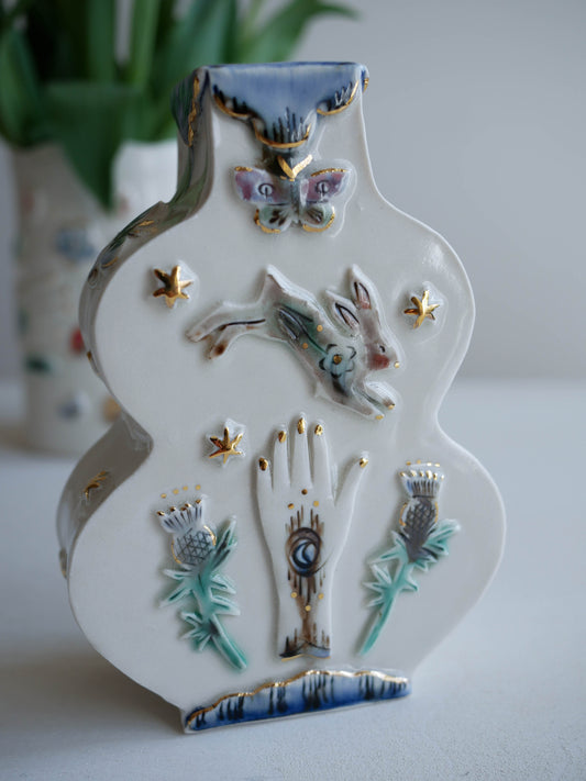 Curve vase * Hand, rabbit, thistle/ Fox, moon, clover