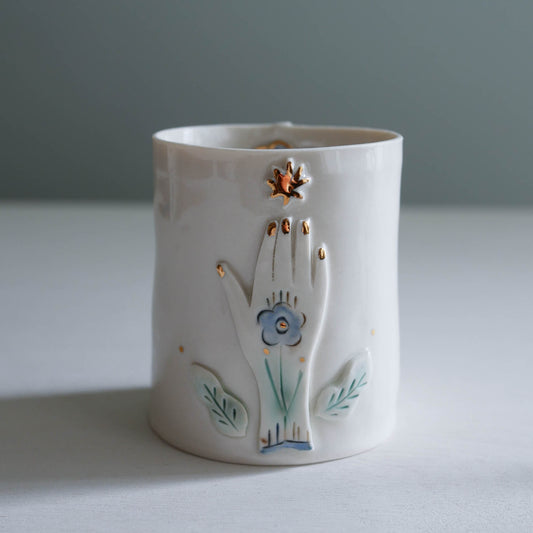 Cup * Hand reaching to star with flowers