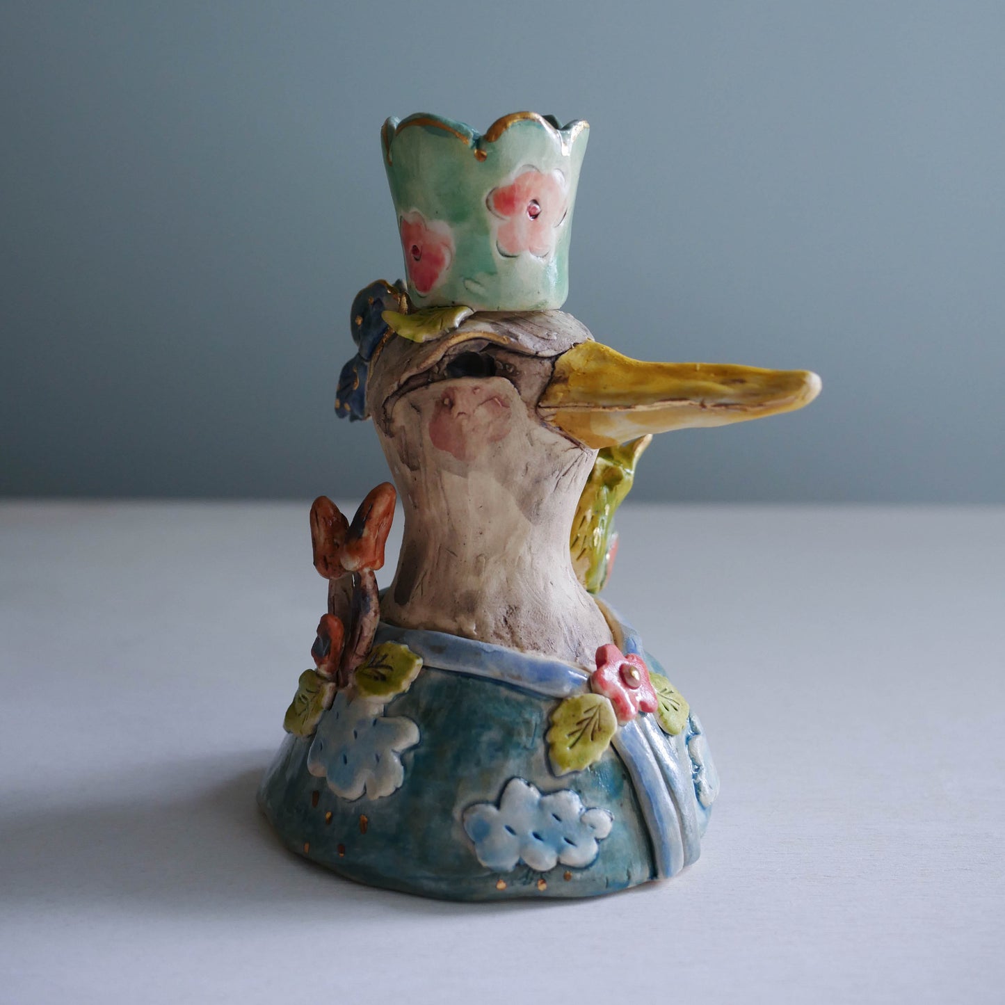 Sculpted bird candle holder/ clouds