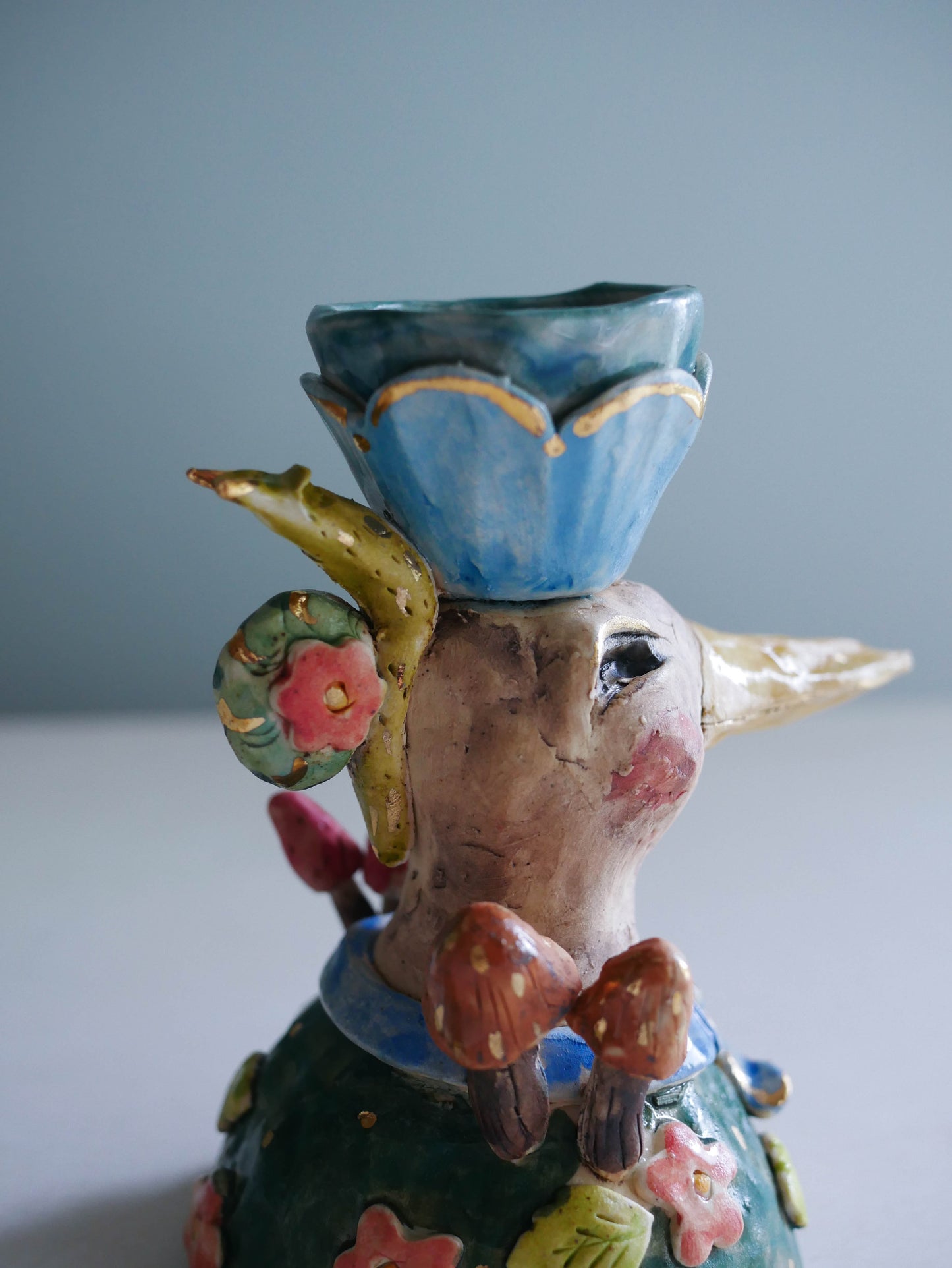 Sculpted bird candle holder/ blue bow