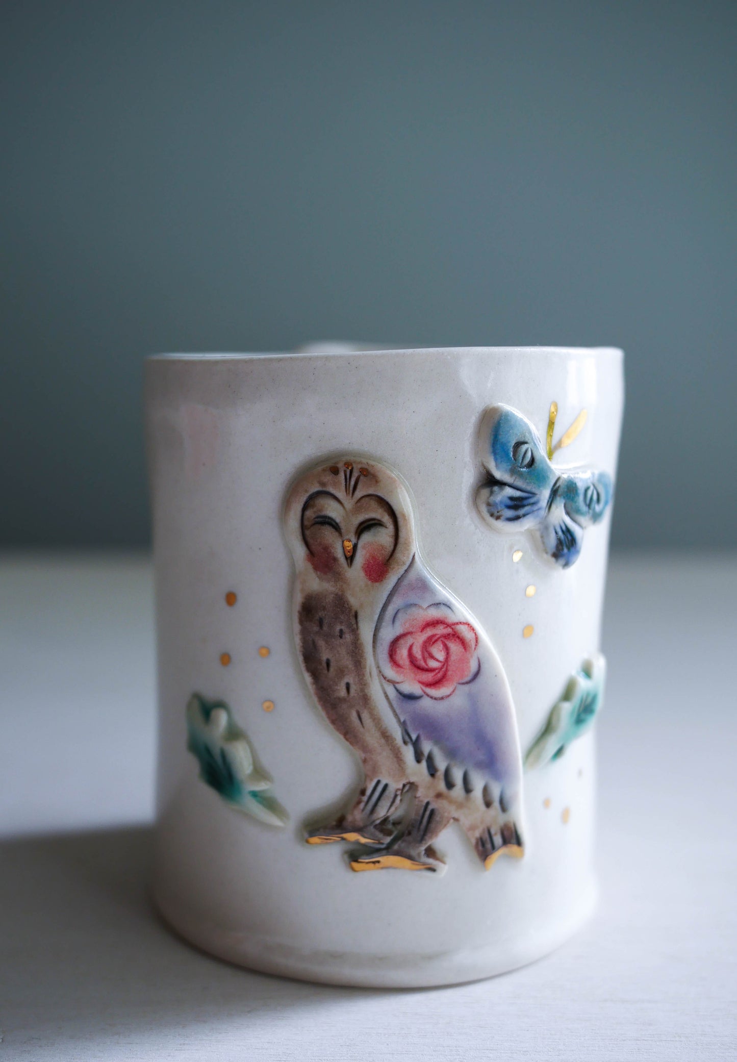 cup * owl with moth