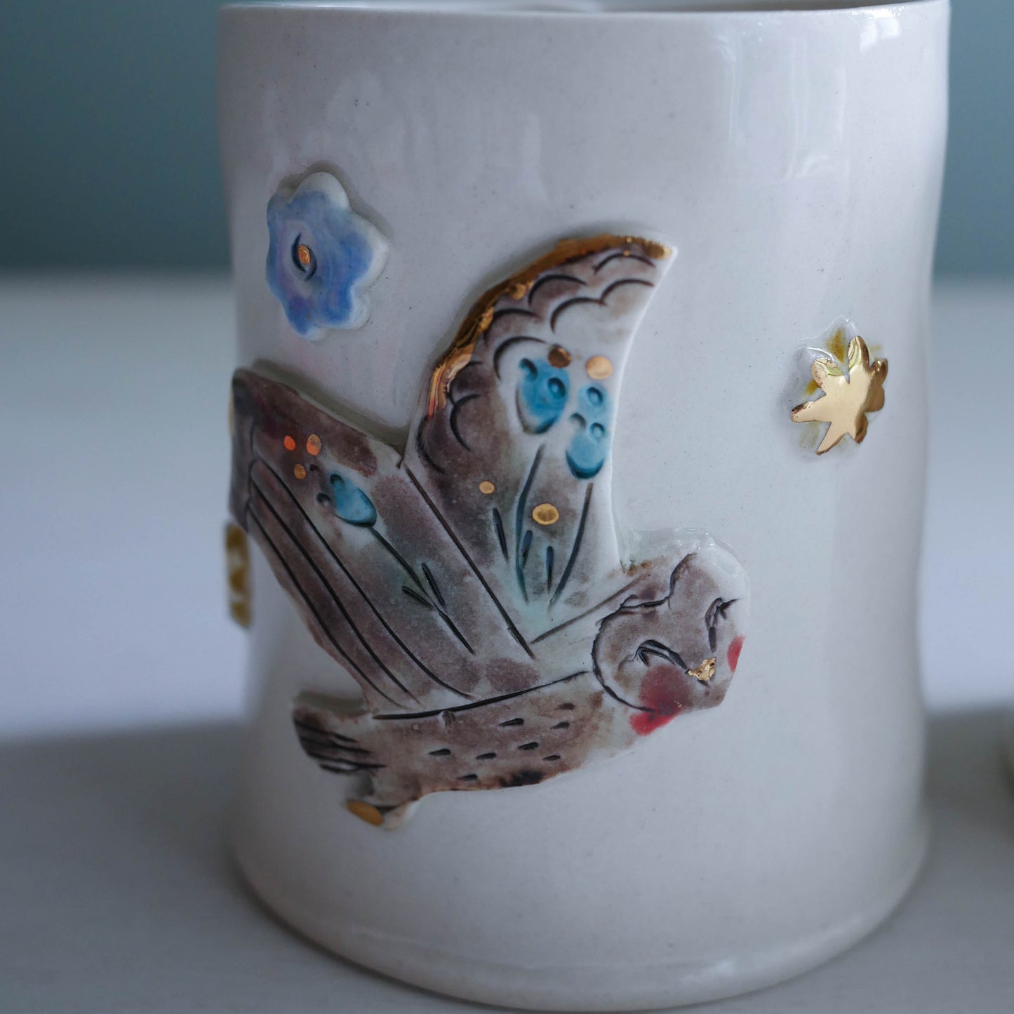 cup * Flying owl with blue flower