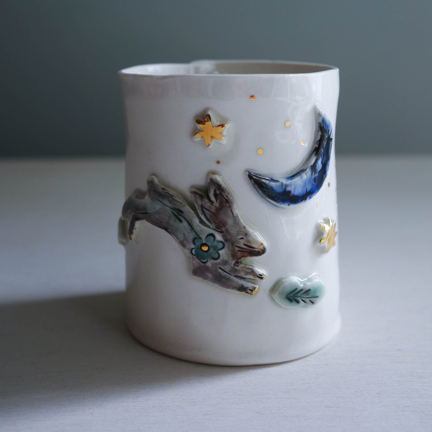 cup * Leaping rabbit